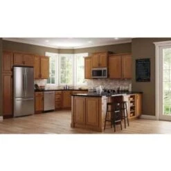 Hampton Bay Hampton Assembled 27x34.5x24 " Base Kitchen Cabinet, M Oak, Glides 12 Hampton Bay Hampton Assembled 27x34.5x24 " Base Kitchen Cabinet, M Oak, Glides -Whirlpool Shop 331475 DetailedProductView3 Lg